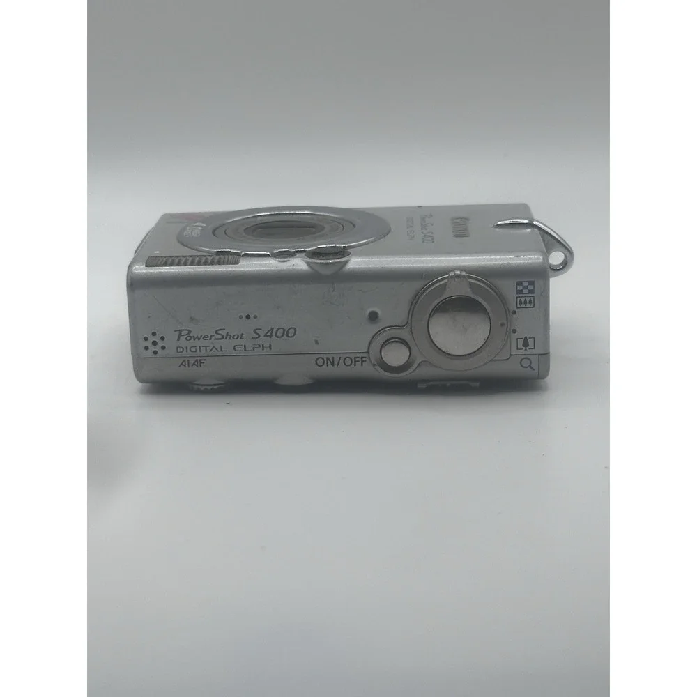 Canon PowerShot S400 Digital ELPH 4.0MP Silver Camera Untested For Parts/Repair